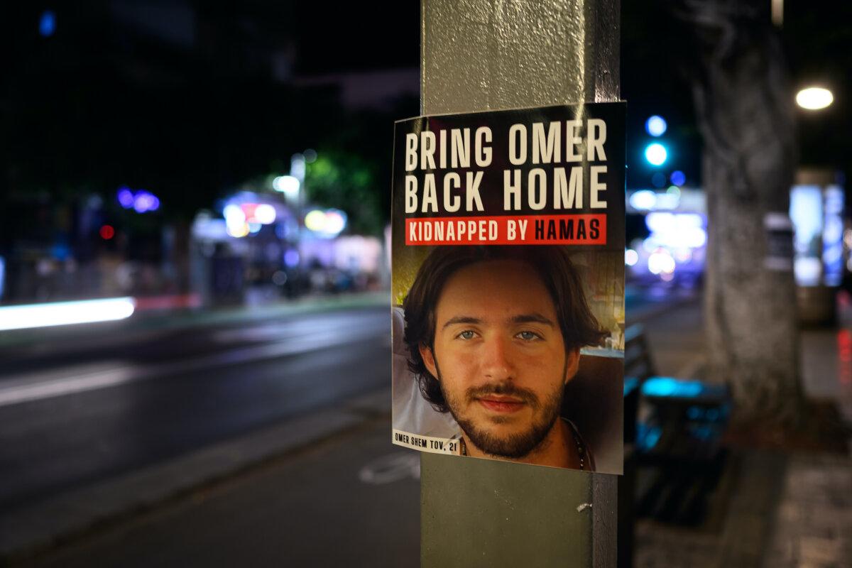 A sign calling for the release of hostage Omer Shem Tov is seen on October 20, 2023, in Tel Aviv, Israel. (Leon Neal/Getty Images)
