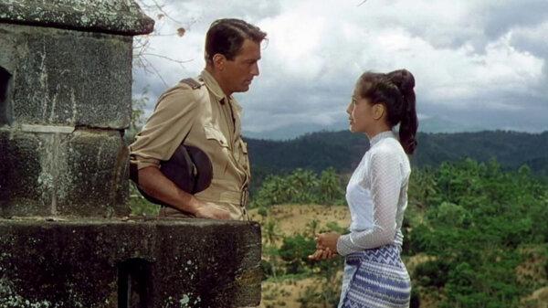 Burmese beauty Anna (Win Min Than, R) represents a gentle, nurturing influence in troubled Squadron Leader Bill Forrester’s (Gregory Peck) life, in “The Purple Plain” (United Artists)