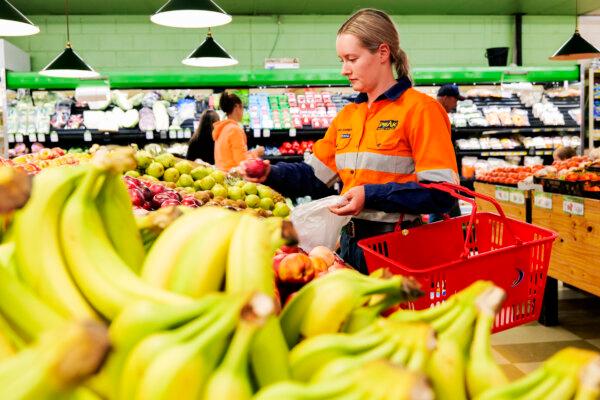 A worker shops at an IGA supermarket in Cobar, Australia, on April 17, 2020. (Jenny Evans/Getty Images)