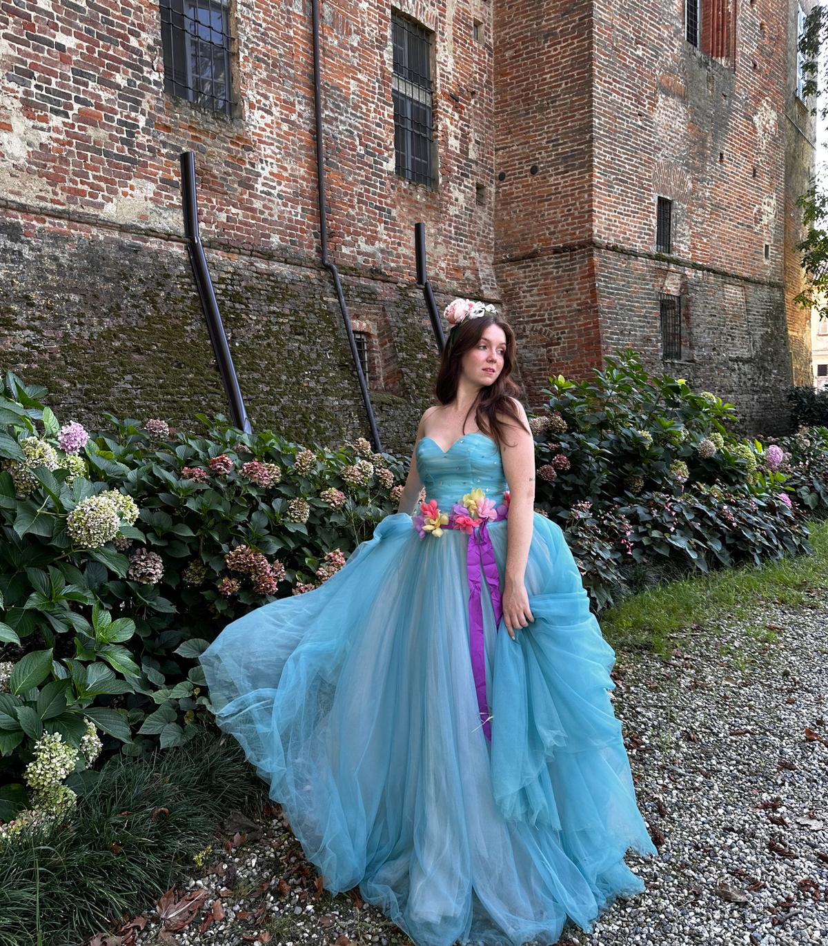 Ms. Sannazzaro dons an extravagant gown and poses for a picture outside the castle. (Courtesy of <a href="https://www.instagram.com/thecastlediary/?hl=en">Ludovica Sannazzaro</a>)