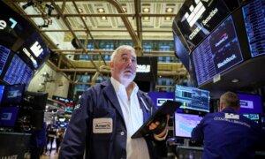 Wall Street Opens Lower as Investors Await Inflation Data
