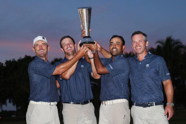 The Crushers GC (L to R) Charles Howell III, Captain Bryson DeChambeau, Anirban Lahiri and Paul Casey celebrate after winning the team championship on Day Three of the LIV Golf Invitational–Miami at Trump National Doral Miami in Doral, Fla., on Oct. 22, 2023. (Cliff Hawkins/Getty Images)
