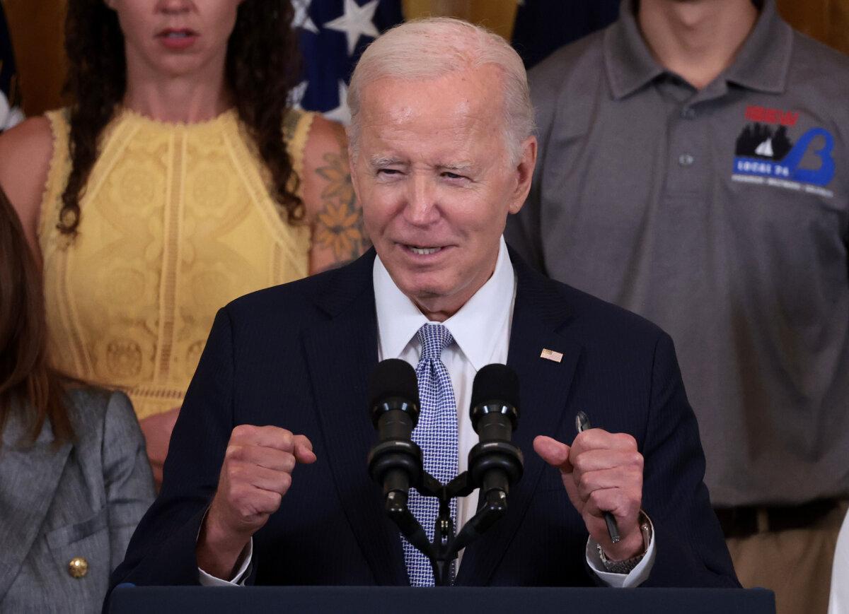 President Joe Biden delivers remarks on the first anniversary of the Inflation Reduction Act in the East Room at the White House in Washington on Aug. 16, 2023. (Win McNamee/Getty Images)