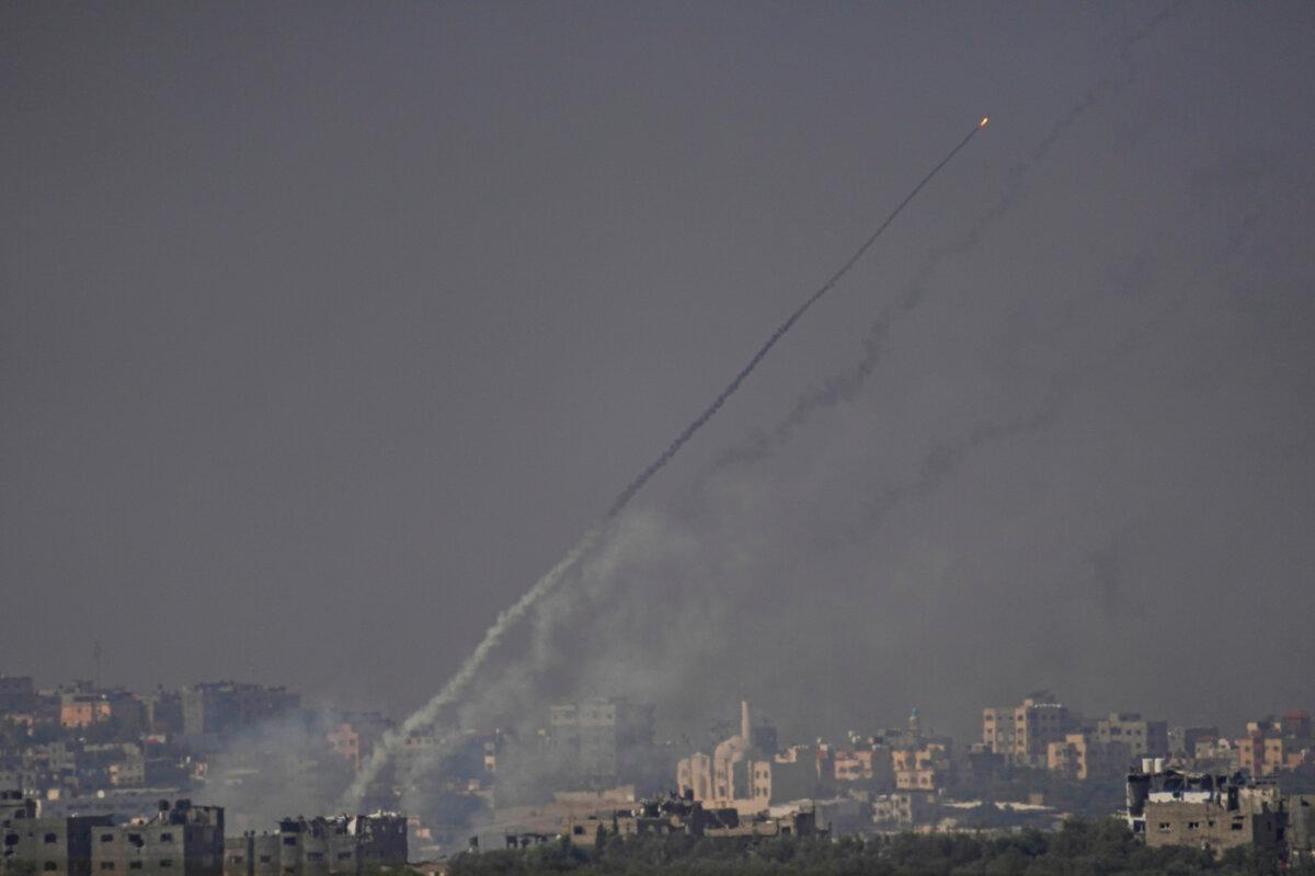 Rockets are fired toward Israel from the Gaza Strip, as seen from southern Israel on Oct. 23, 2023. (Ariel Schalit/AP Photo)
