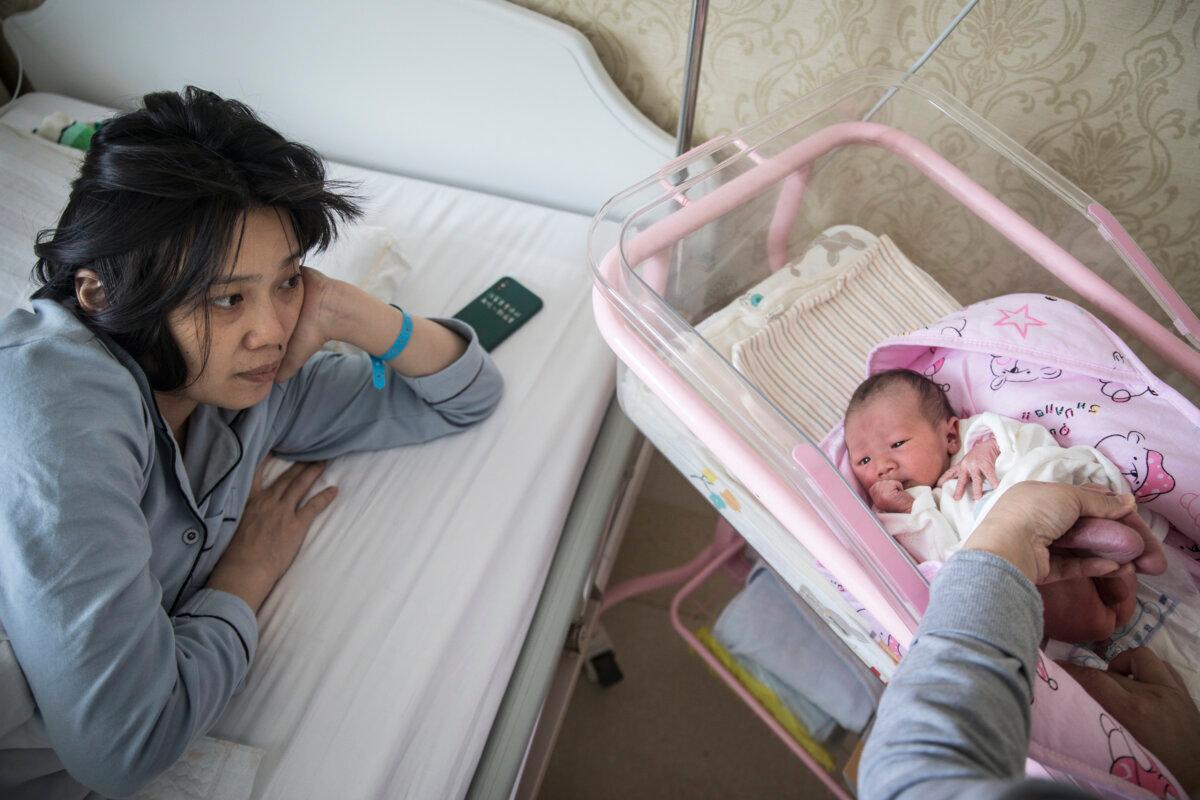 A mother and her newborn baby in a private obstetric hospital in Wuhan, Hubei Province, China, on Feb. 21, 2020. (Getty Images)
