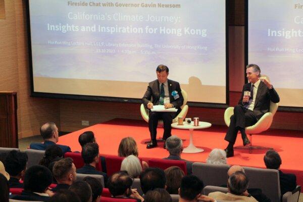  California Gov. Gavin Newsom (R) speaks on the state's experience in combating climate change with professor Gong Peng at the University of Hong Kong, in Hong Kong, on Oct. 23, 2023 (Xinqi Su/AFP via Getty Images)
