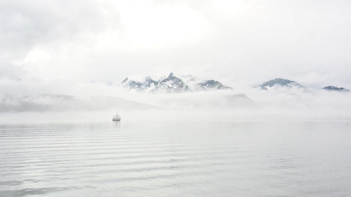 Ghostly clouds shrouded Resurrection Bay during the authors' Kenai Fjords Tours cruise. (Maria Coulson)
