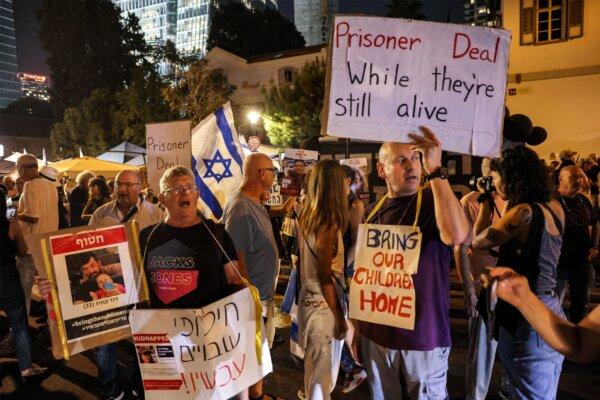 People attend a demonstration calling for the release of Israeli hostages held by Palestinian terrorists since the Oct. 7 attack, near Azrieli Mall in Tel Aviv on Oct. 24, 2023. (Ahmad Gharabli/AFP via Getty Images)