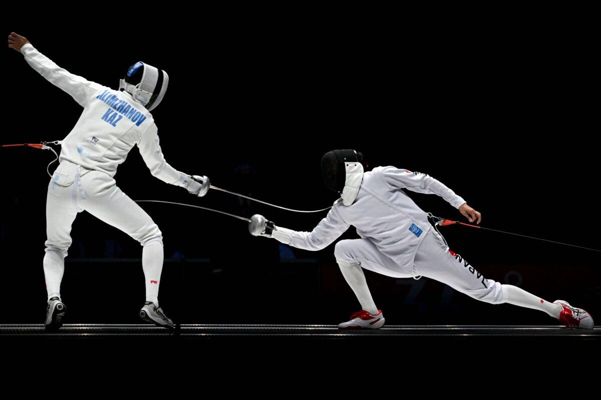 Fencers compete in a file photo taken during the 2022 Asian Games in Hangzhou in China on Sept. 29, 2023. (Wang Zhao/AFP via Getty Images)