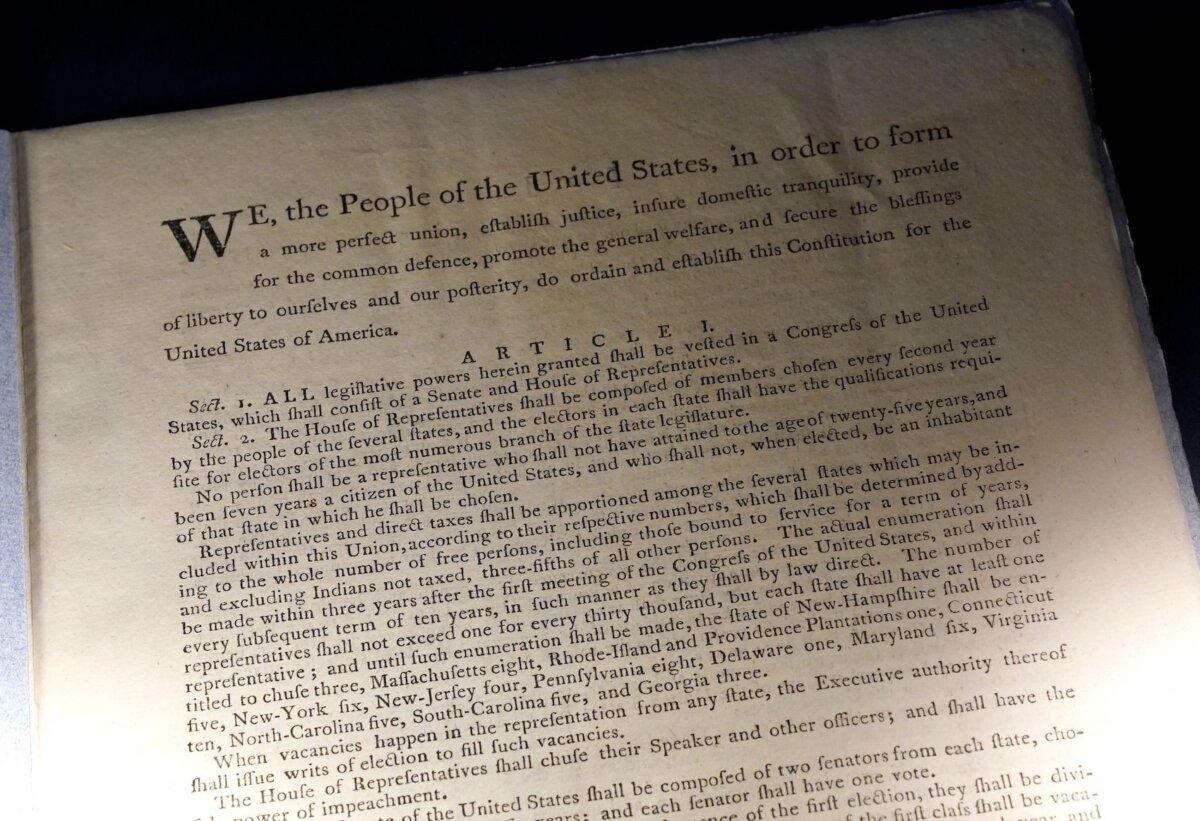 A first printing of the U.S. Constitution, one of just 13 copies known to exist and one of only two known copies that remain in private hands, on display at Sotheby's Auction House in New York on Nov. 30, 2022. (Timothy A. Clary/AFP via Getty Images)