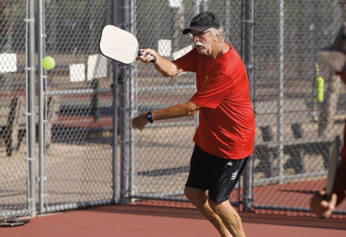 Pickleball players span a wide range of ages. The sport is popular with seniors because it is a low-impact physical activity.