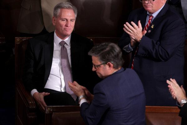 Fellow lawmakers applaud as former Speaker of the House Kevin McCarthy (R-Calif.) casts his vote as the House of Representatives holds an election for a new Speaker of the House at the U.S. Capitol in Washington on Oct. 25, 2023. (Alex Wong/Getty Images)