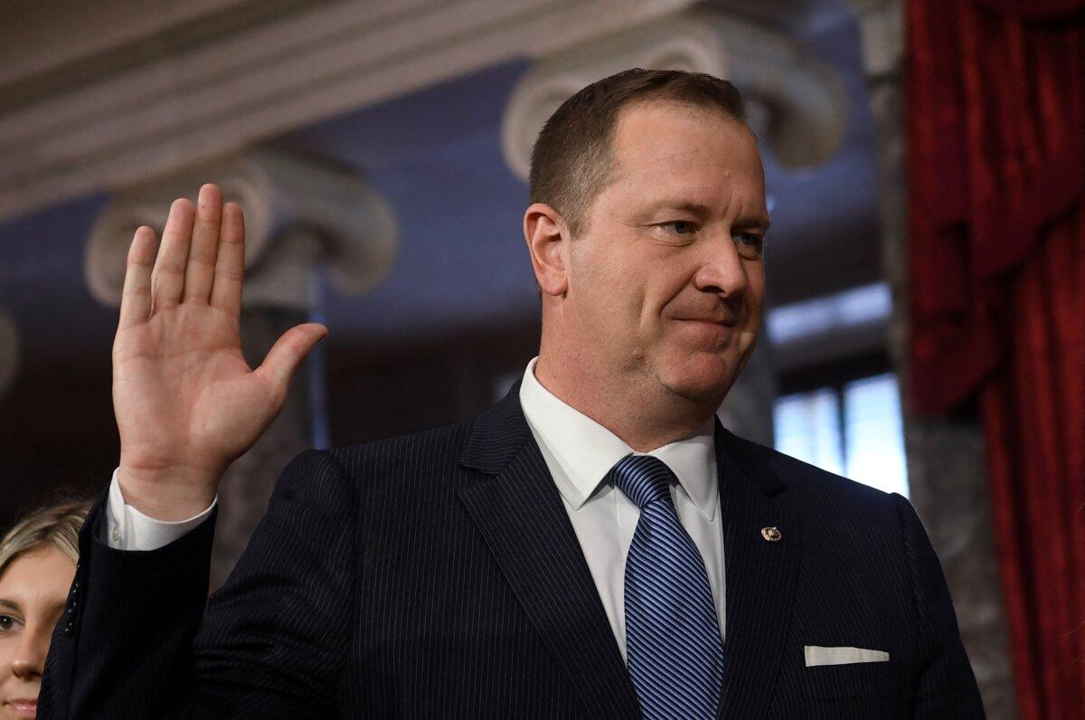 Sen. Eric Schmitt (R-Mo.) is ceremonially sworn in by Vice President Kamala Harris for the 118th Congress in the Old Senate Chamber at the U.S. Capitol on Jan. 3, 2023. (Olivier Douliery/AFP via Getty Images)