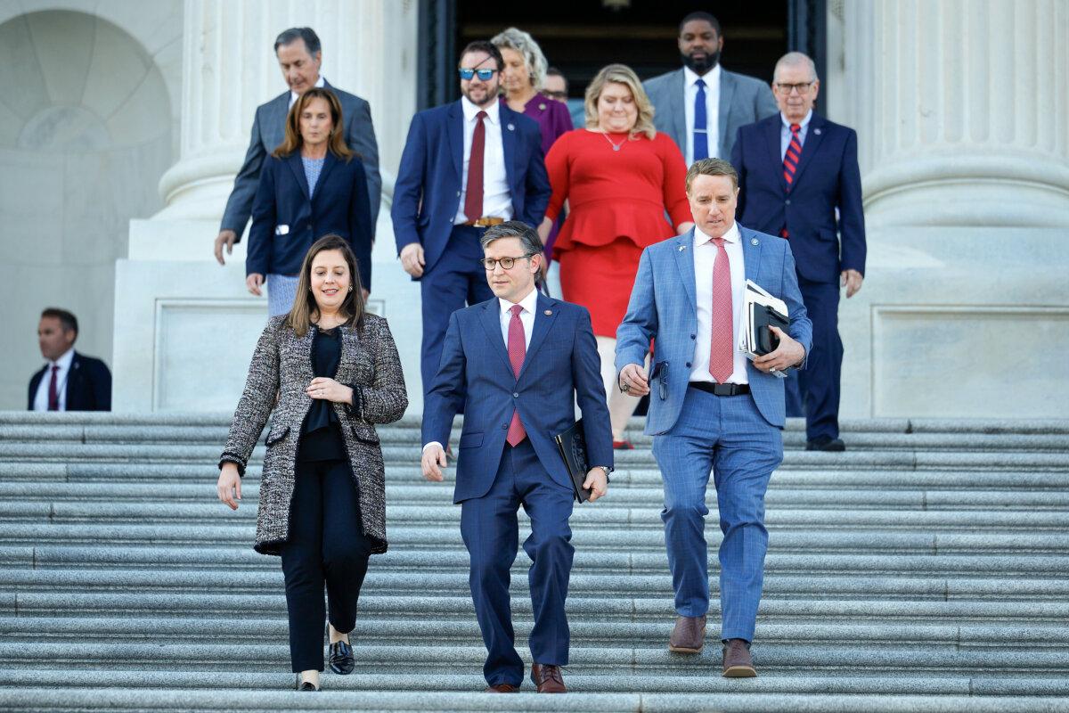 Newly elected Speaker of the House Mike Johnson (R-La.) (C) walks out of the U.S. Capitol with Rep. Elise Stefanik (R-N.Y.) (L) and Rep. Pat Fallon (R-Texas) before delivering remarks, in Washington on Oct. 25, 2023. (Chip Somodevilla/Getty Images)