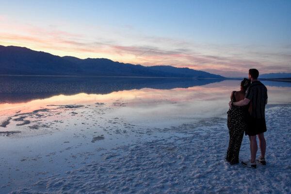 British visitors Todd Robertson and Karina Shah at Badwater Basin, Death Valley National Park. (Christopher Reynolds/Los Angeles Times/TNS)