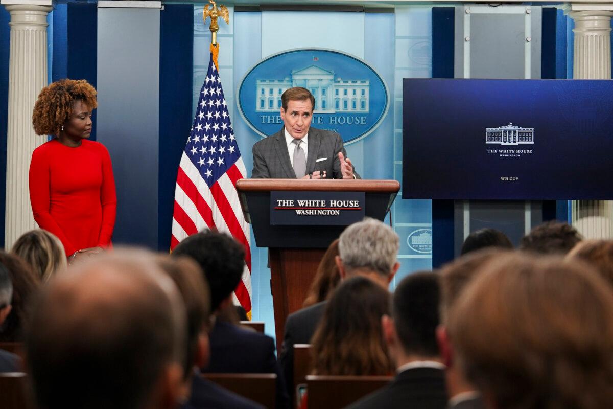 White House Press Secretary Karine Jean-Pierre (L) listens while National Security Council Coordinator for Strategic Communications John Kirby (R) speaks during the press briefing at the White House in Washington on Oct. 26, 2023. (Madalina Vasiliu/The Epoch Times)