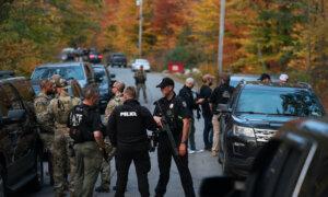 Police Surround Home in Search for Suspect in Fatal Shooting of 18 in Maine