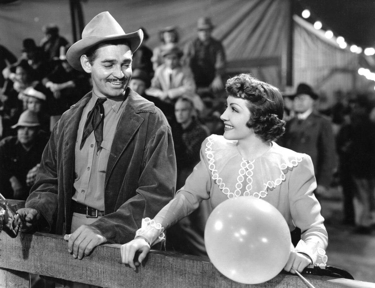 A publicity still for the 1940 film "Boom Town" starring Clark Gable (L) and Claudette Colbert. (MovieStillsDB)