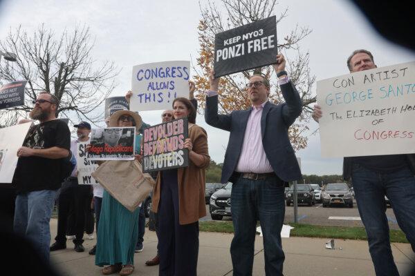 Protesters greet Rep. George Santos (R-N.Y.) as he leaves a federal courthouse in Central Islip, New York, on Oct. 27, 2023. (Spencer Platt/Getty Images)