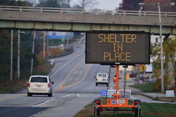  A shelter-in-place sign is displayed in the aftermath of a mass shooting in Lewiston, Maine, on Oct. 27, 2023. (Angela Weiss/AFP via Getty Images)