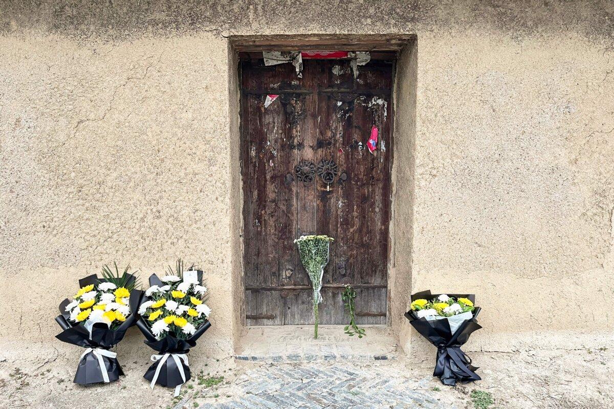 Flowers are seen left in front of the former house of former Chinese premier Li Keqiang in Dingyuan County, Chuzhou City, in China's eastern Anhui Province on Oct.  27, 2023. (Rebecca Bailey/AFP via Getty Images)
