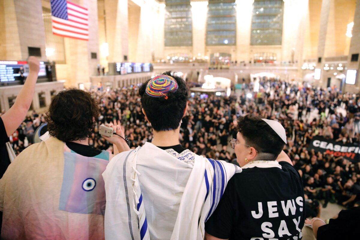 People demonstrate calling for a cease-fire amid war between Israel and Hamas, at Grand Central Station in New York City on Oct. 27, 2023. (Kena Betancur/AFP via Getty Images)