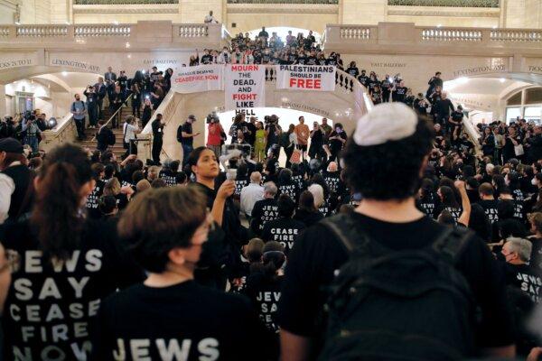 People demonstrate calling for a cease-fire amid war between Israel and Hamas, at Grand Central Station in New York City on Oct. 27, 2023. (KENA BETANCUR/AFP via Getty Images)