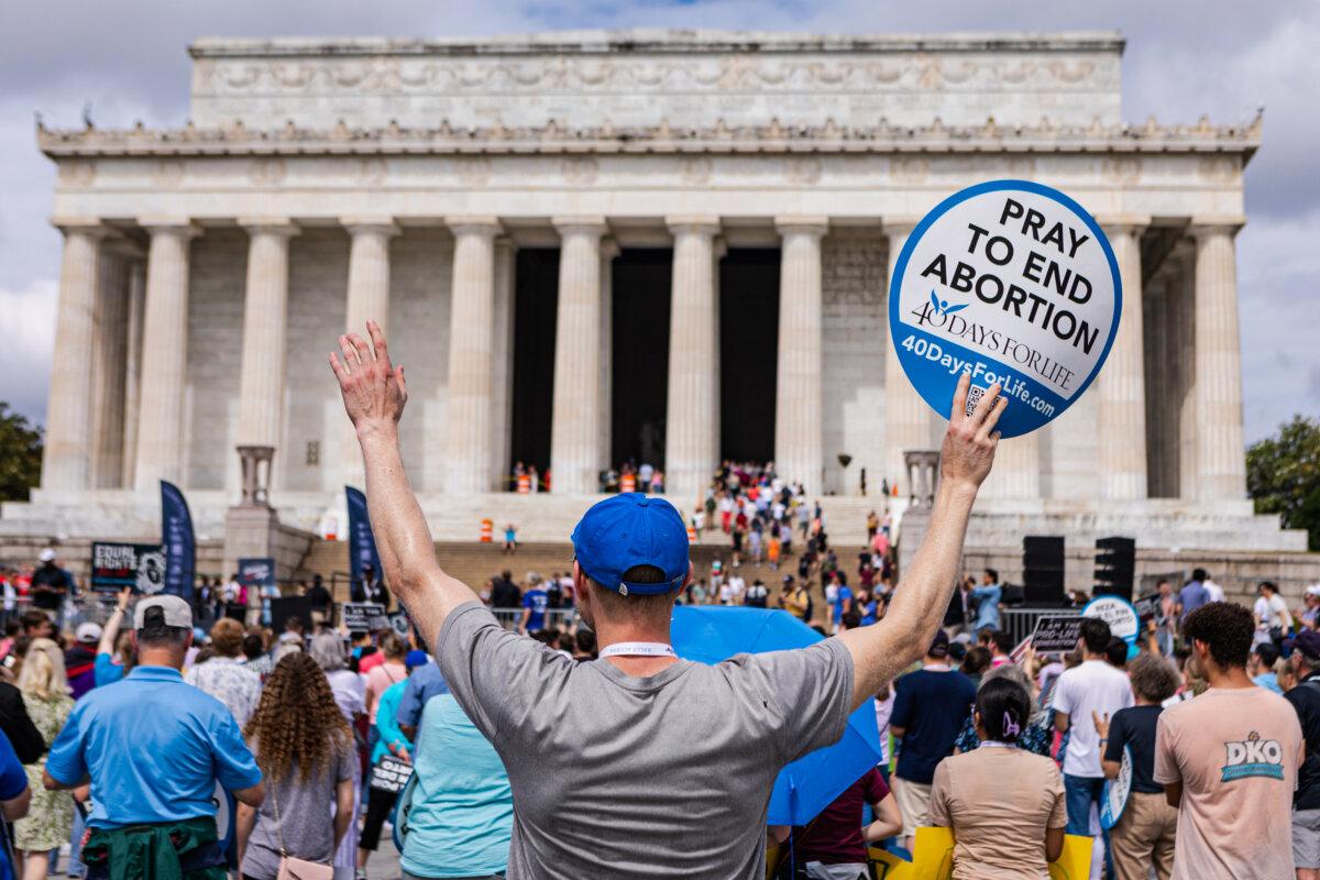Pro-life activists participate in a Celebrate Life Day Rally at the Lincoln Memorial in Washington on June 24, 2023. The rally was held to commemorate the first anniversary of the Dobbs v. Jackson Women's Health Supreme Court decision, which reversed Roe v. Wade. (Anna Rose Layden/Getty Images)