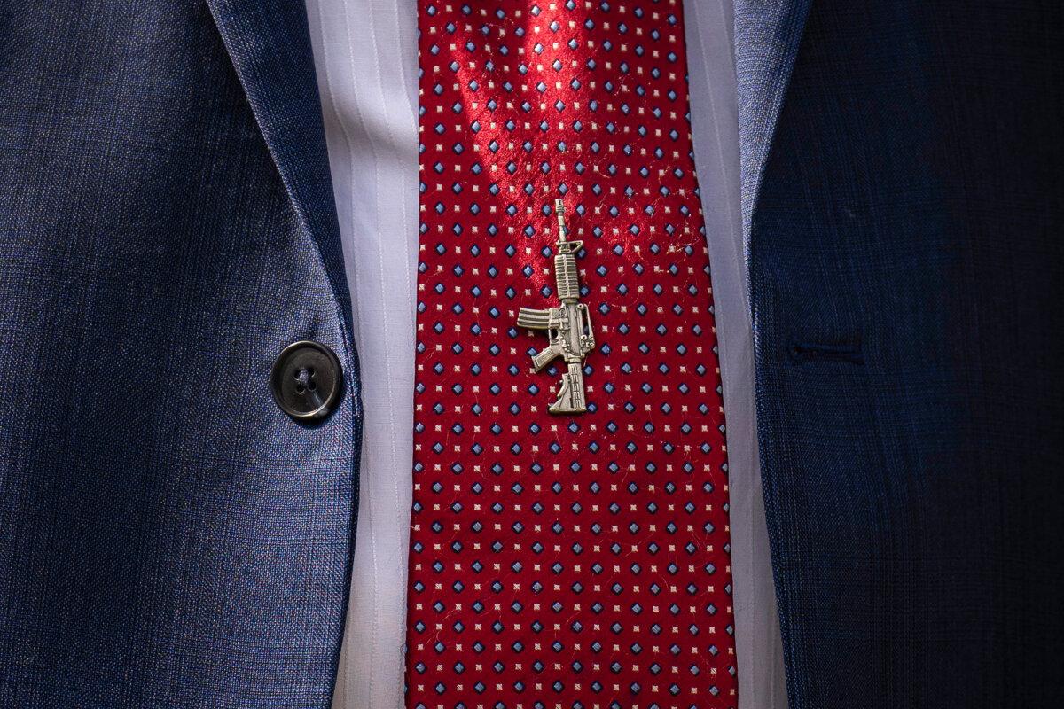 Rep. Andrew Clyde (R-Ga.) wears a gun tie pin during a news conference with members of the House Freedom Caucus outside the U.S. Capitol in Washington on Sept. 12, 2023. (Drew Angerer/Getty Images)