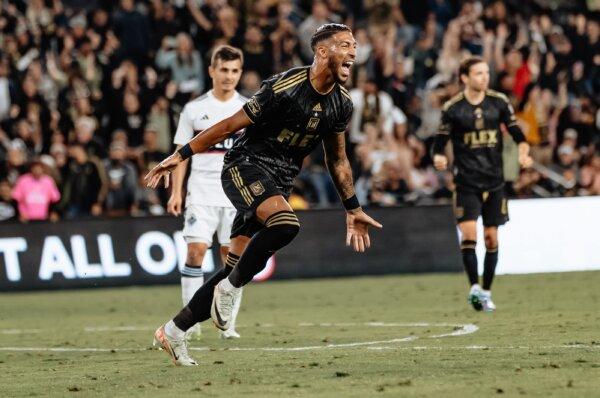 Los Angeles FC forward Denis Bouanga celebrates after scoring a goal against the Vancouver Whitecaps FC in a round one match of the 2023 MLS Cup Playoffs at BMO Stadium in Los Angeles on Oct. 28, 2023. (Courtesy of LAFC via The Epoch Times)