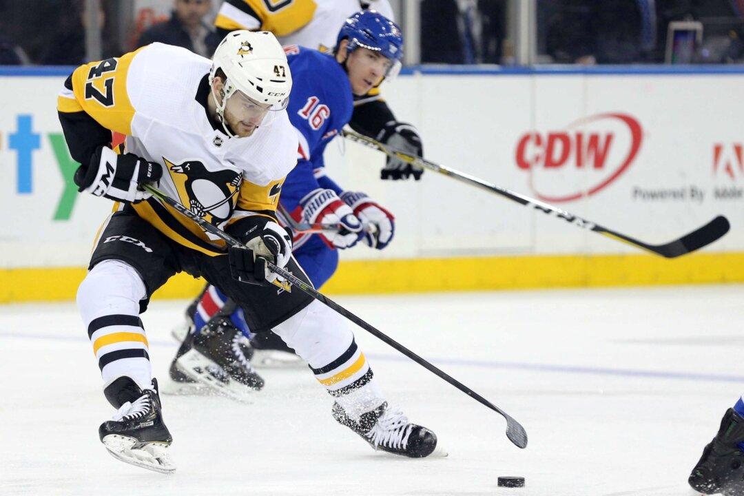 American Hockey Player Adam Johnson, 29, Dies After Getting Cut in Neck by Skate