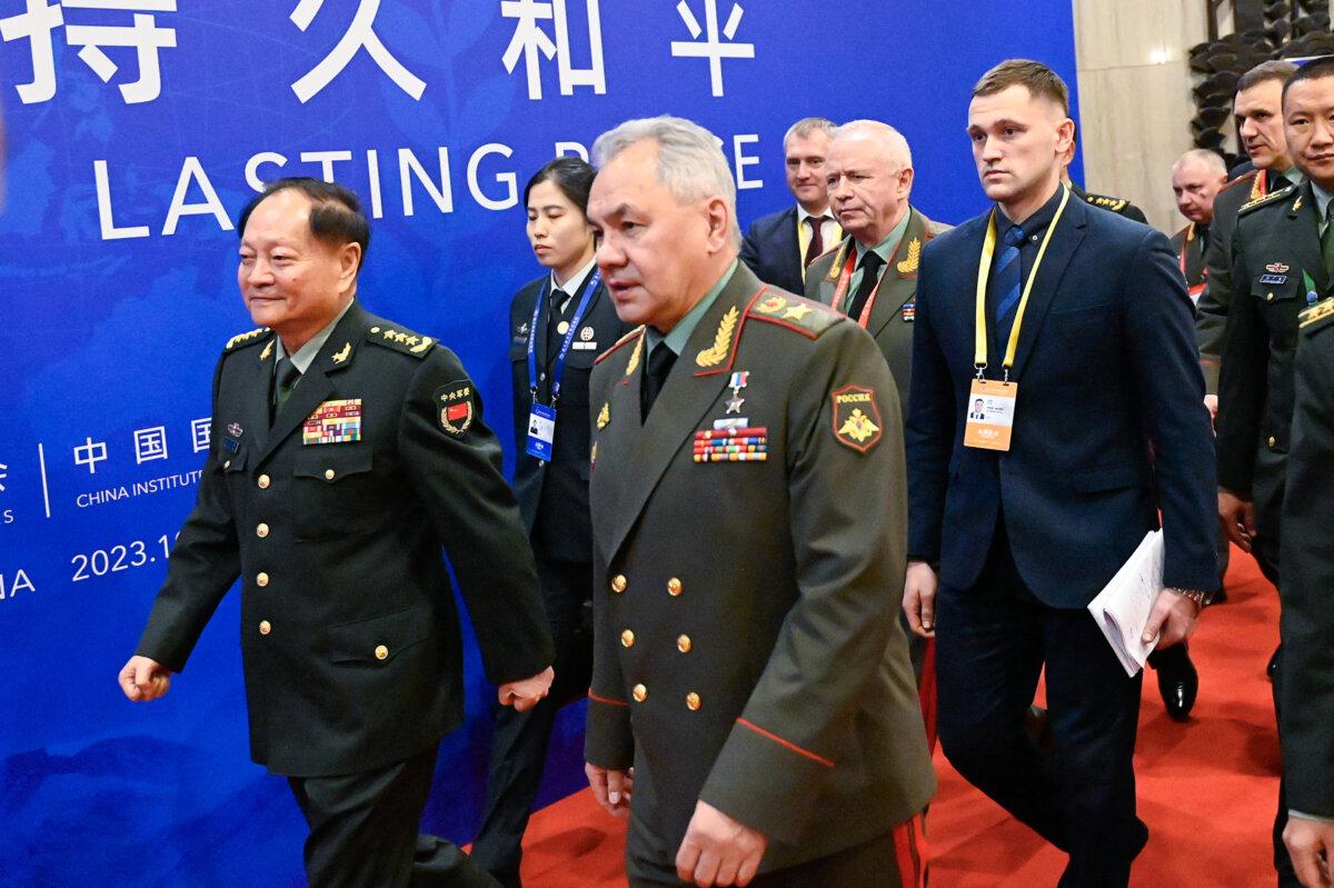 China's Vice Chairman of the Central Military Commission Zhang Youxia (L) and Russia's Defence Minister Sergei Shoigu arrive at the Xiangshan Forum in Beijing on Oct. 30, 2023. (Pedro Pardo /AFP via Getty Images)