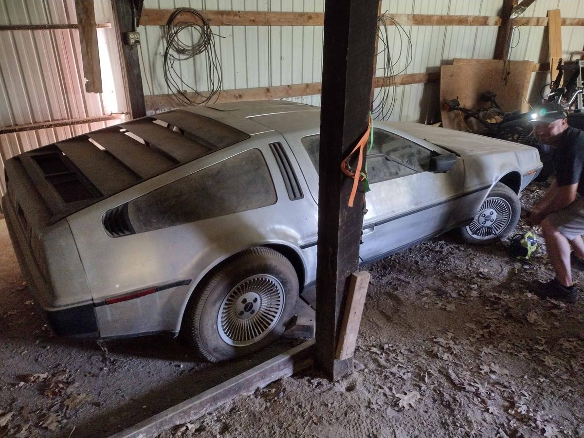 The DeLorean barn find from the side-rear. (Courtesy of Michael McElhattan)