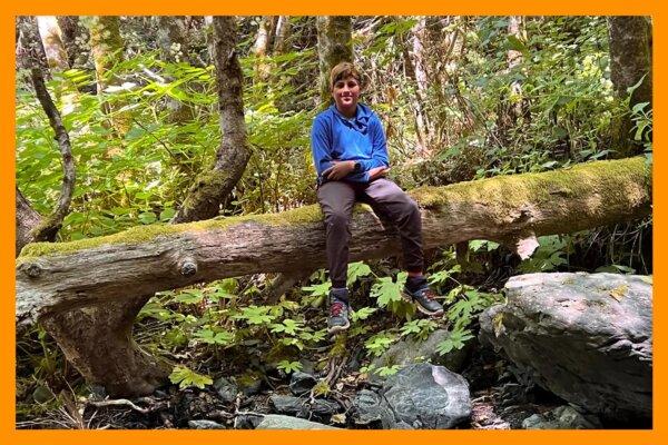 Devash logs on—wilderness style—during the August family camping trip. (Seth Liss/Los Angeles Times/TNS)