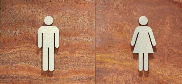 Male and female bathroom signs can be seen at Perth Airport, Australia, on Oct. 31, 2023. (Susan Mortimer/The Epoch Times)