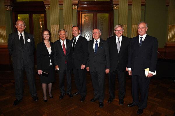 Former Prime Ministers of Australia (L-R), Malcolm Fraser, Julia Gillard, Bob Hawke, Tony Abbott, John Howard, Kevin Rudd, and Paul Keating assemble for a photograph at the completion of the state memorial service for former Australian Prime Minister Gough Whitlam at Sydney Town Hall in Sydney, Australia, on Nov. 5, 2014. (Dan Himbrecht - Pool/Getty Images)