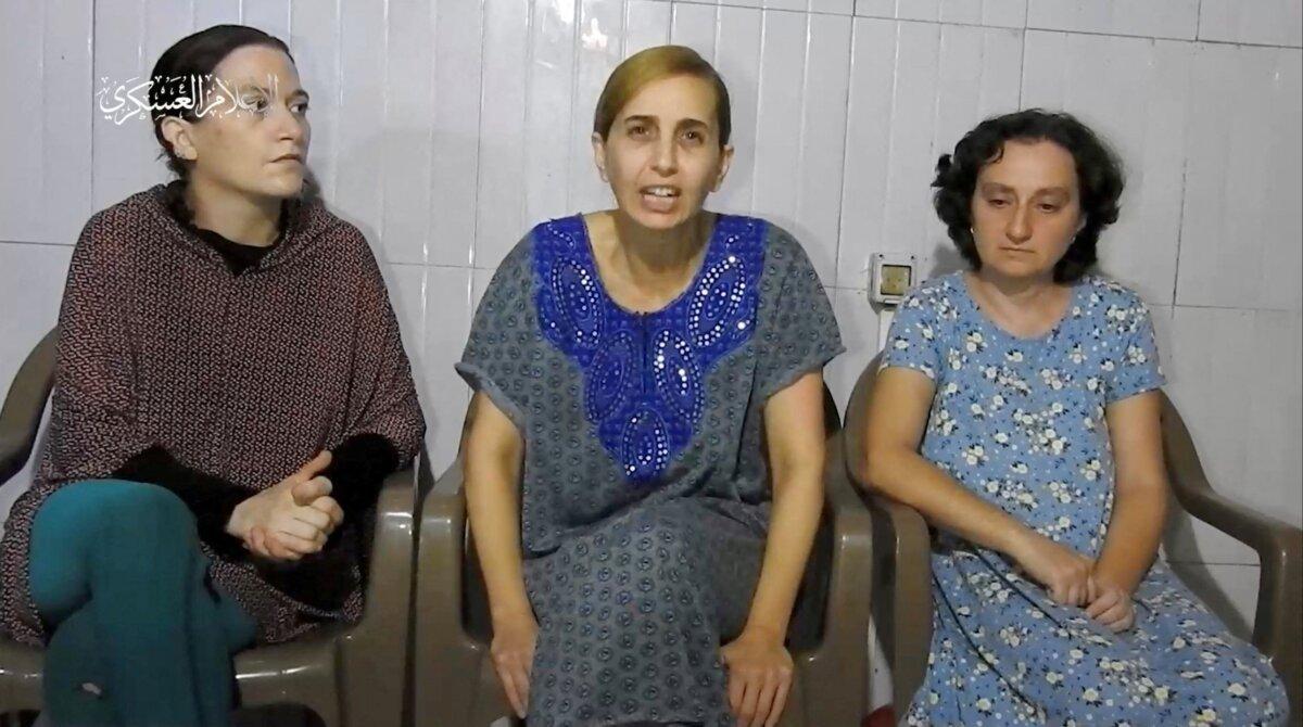 Three Israeli women, identified by Israeli Prime Minister Benjamin Netanyahu as Yelena Trupanob, Danielle Aloni, and Rimon Kirsht, who are held captive by the Hamas terrorist group in Gaza after being abducted from Israeli homes on Oct. 7, give a statement in this handout video grab obtained by Reuters on Oct. 30, 2023. (Al-Qassam Brigade, Military Wing of Hamas via Telegram/Handout via Reuters)