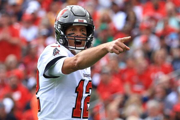 Tom Brady, Tampa Bay Buccaneers quarterback, points at the Philadelphia Eagles in the first quarter of the NFC Wild Card Playoff game at Raymond James Stadium on Jan. 16, 2022, in Tampa, Florida. (Mike Ehrmann/Getty Images)
