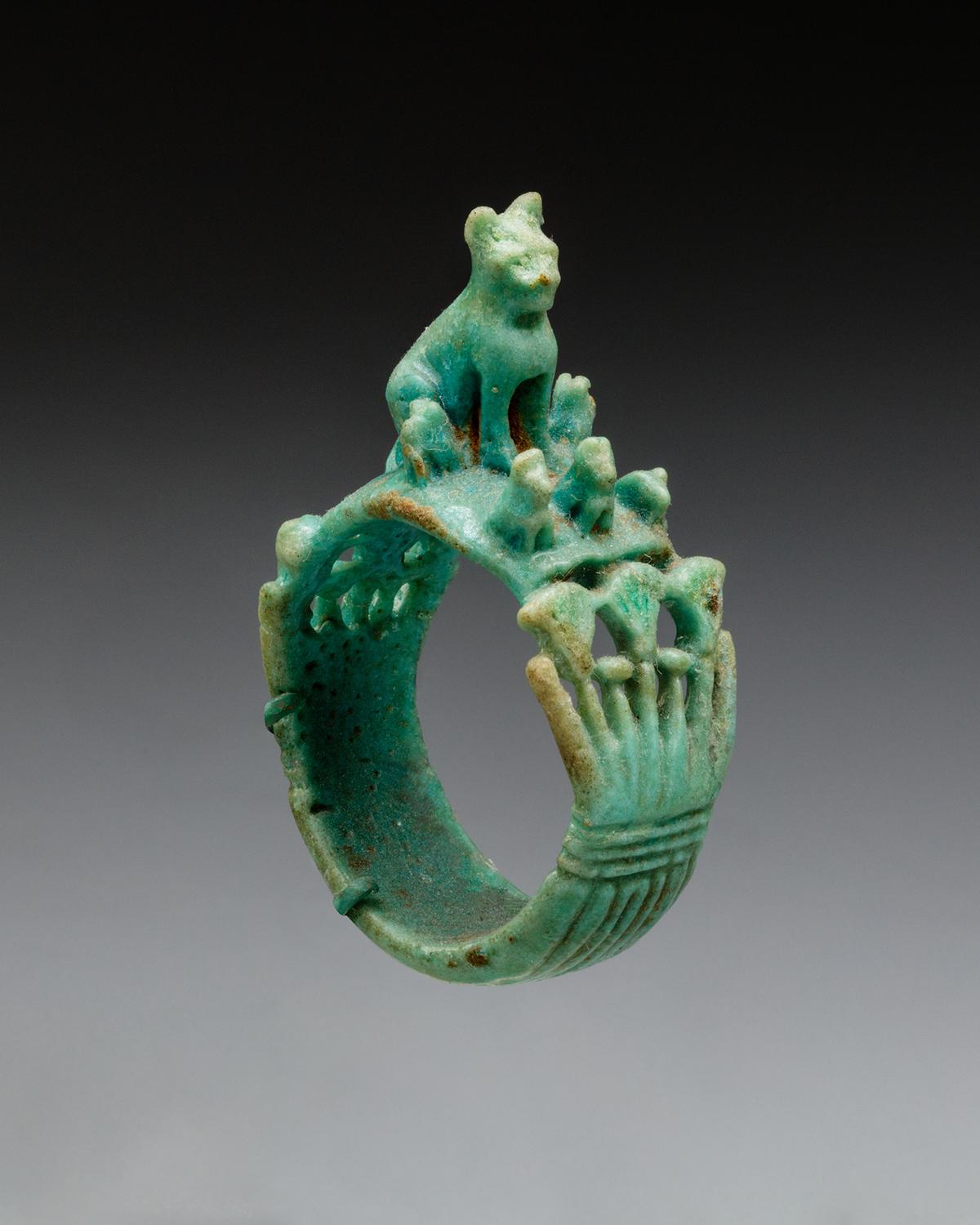 "Ring with Cat and Kittens," circa 1295–664 B.C., from the Third Intermediate Period (Ramesside). Faience; .63 inches by .5 inches by .69 inches. The Metropolitan Museum of Art, New York City. (Public Domain)