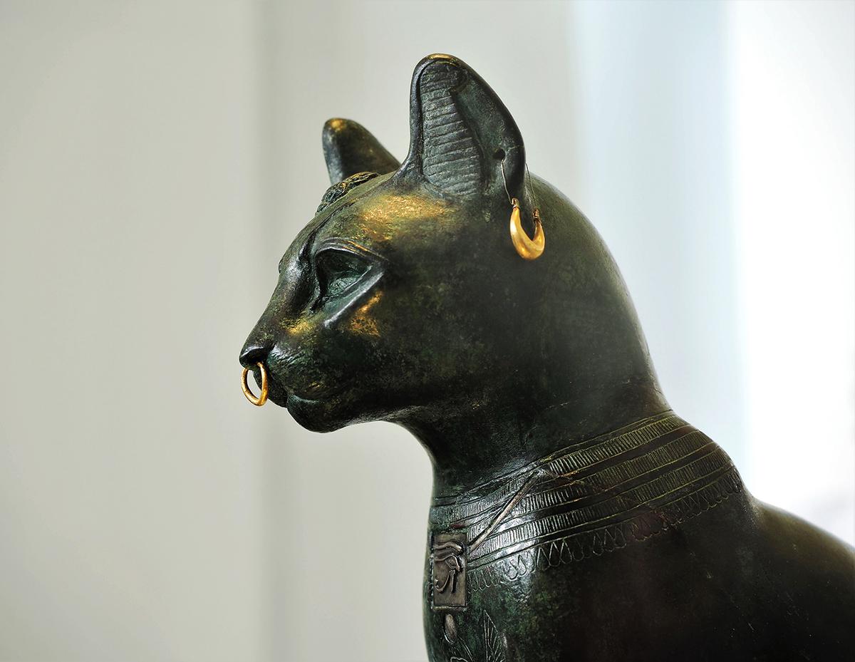 Detail of "The Gayer-Anderson Cat" at the British Museum in London. (<a href="https://www.shutterstock.com/image-photo/london-uk-08112017-bronze-head-depicting-2243260273">nininika</a>/Shutterstock)