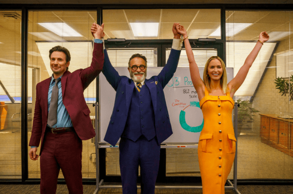 (L–R) Pete Brenner (Chris Evans), Dr. Neel (Andy Garcia), and Liza Drake (Emily Blunt), in "Pain Hustlers." (Brian Douglas/Netflix)