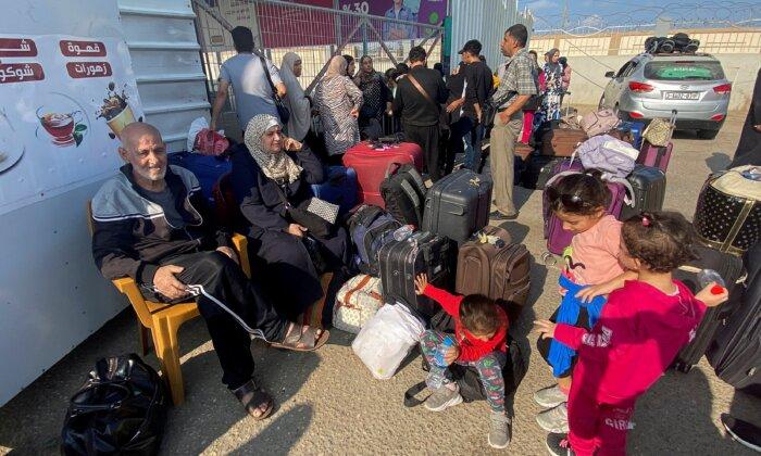 First Evacuees Leave Gaza as Israeli Offensive Intensifies