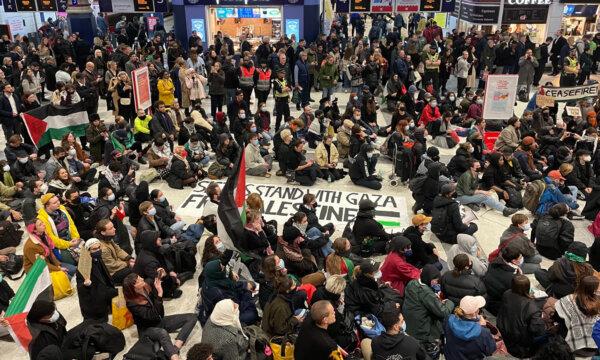 Protesters staging a sit-in, organised by Sisters Uncut, at Liverpool Street station in London on Oct. 31, 2023. (Sisters Uncut/PA Wire)