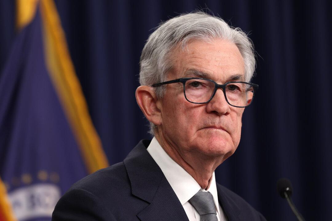 Stocks Slump as Fed’s Powell Dismisses Swift Rate Cuts
