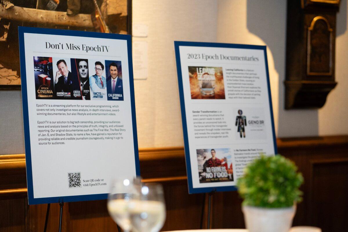 Posters describe The Epoch Times content at the newspaper's 2023 Annual Gala, held in Newport Beach, Calif., on Oct. 28, 2023. (Oksana Khan/The Epoch Times)