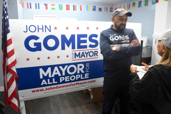 Democratic mayoral candidate John Gomes speaks with voters in Bridgeport, Conn., on Sept. 18, 2023. (Ned Gerard/Hearst Connecticut Media via AP)