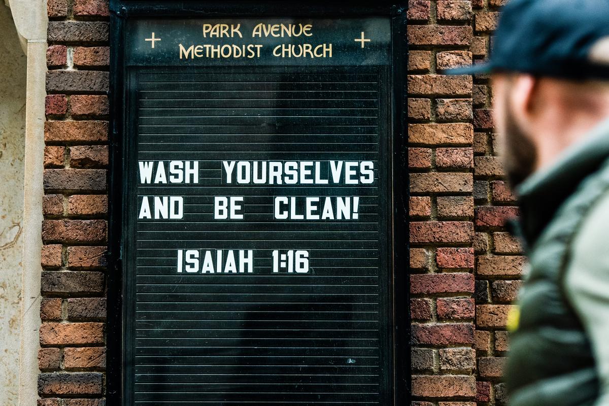 A Bible phrase adorns the outside of church in New York City on March 12, 2020. (Jeenah Moon/Getty Images)