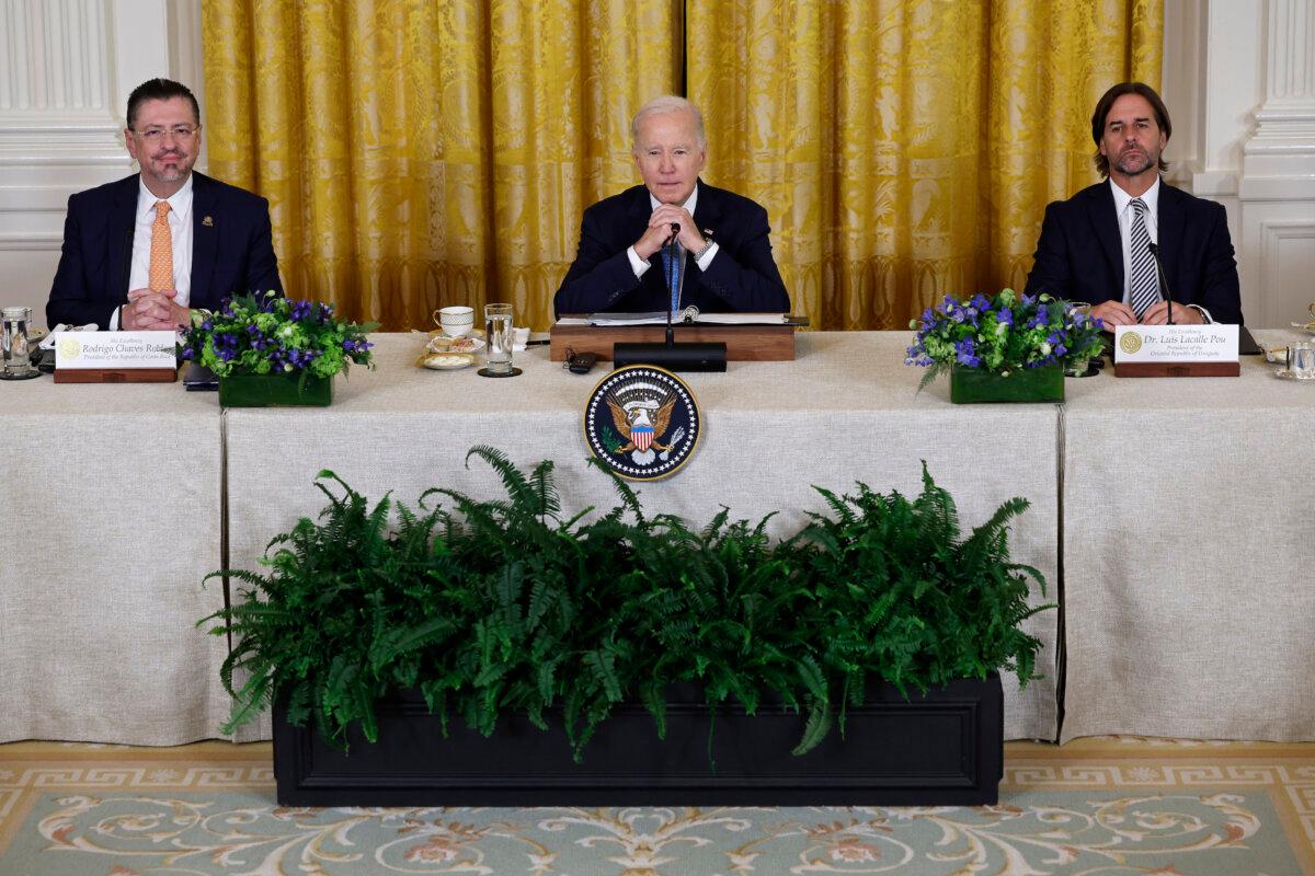 (L–R) Costa Rican President Rodrigo Chaves Robles, U.S. President Joe Biden, Uruguayan President Luis Lacalle Pou, and other leaders attend the plenary session of the inaugural Americas Partnership For Economic Prosperity Leaders' Summit in the East Room of the White House on Nov. 3, 2023. (Chip Somodevilla/Getty Images)