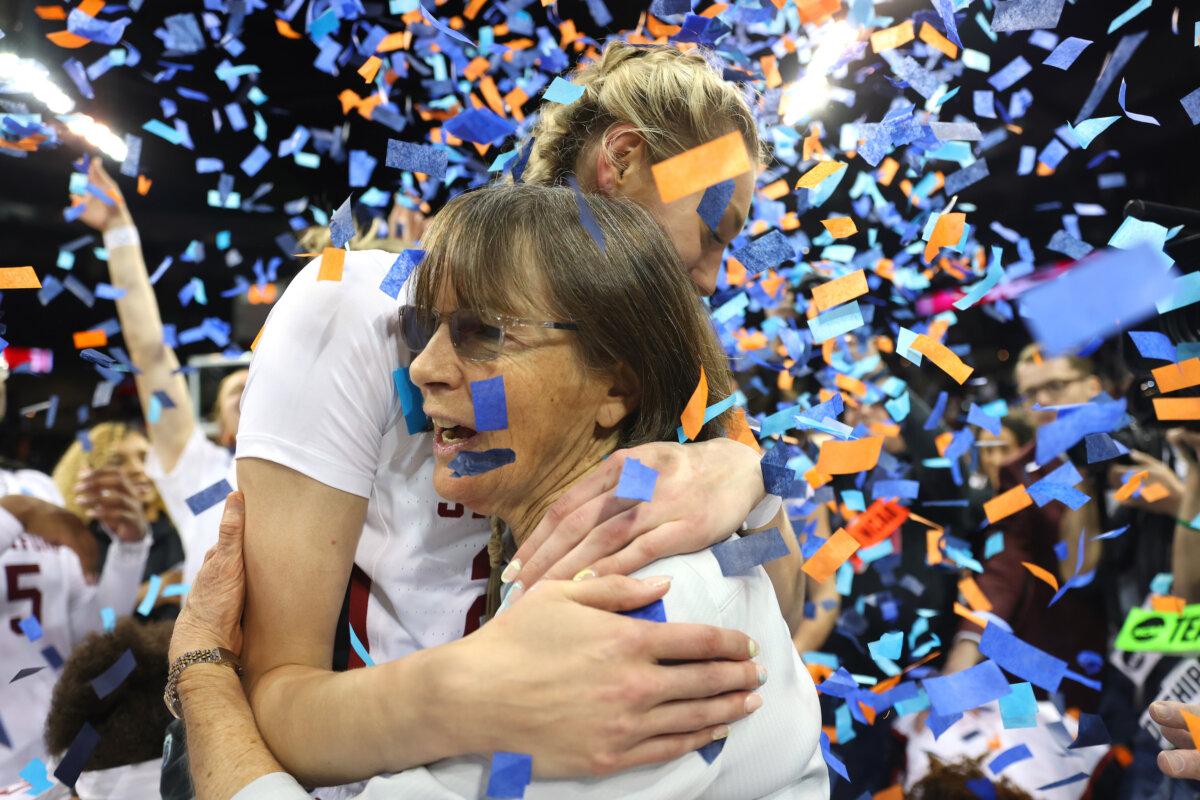 Head coach Tara VanDerveer of the Stanford Cardinal hugs Cameron Brink after defeating the Texas Longhorns 59-50 in the NCAA Women's Basketball Tournament Elite 8 Round in Spokane, Wash., on March 27, 2022. (Abbie Parr/Getty Images)