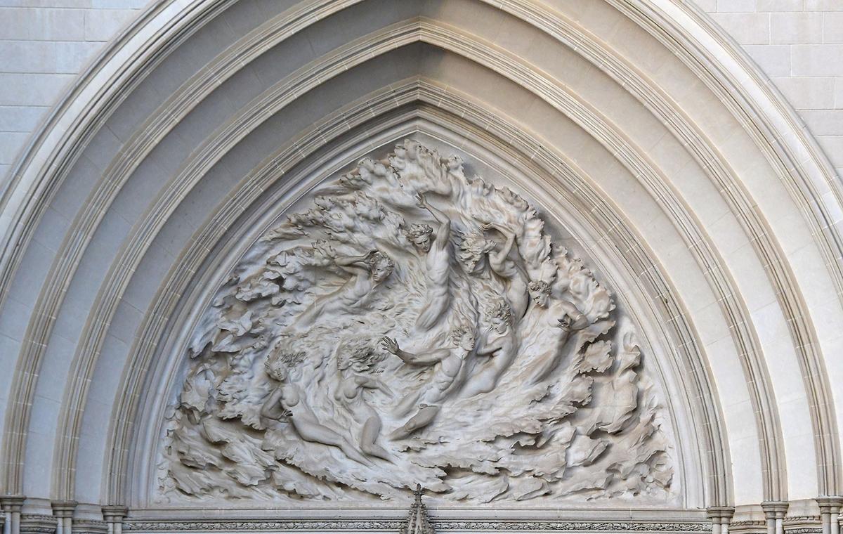“I saw 'Ex Nihilo' ('Out of Nothingness') as a single expression of creation, as the metamorphosis of divine spirit and energy,” said sculptor Frederick Hart about his tympanum above the central door of the Washington National Cathedral. (Eva Hambach/Getty Images)